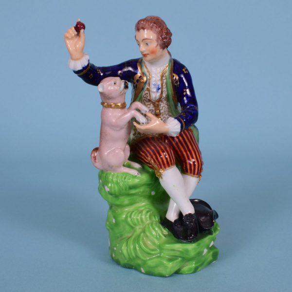 Derby Figure of a Man with a Pug Dog