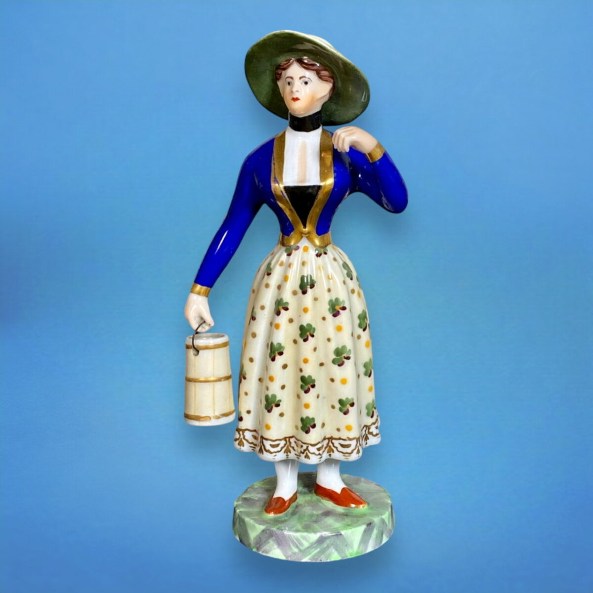 Chamberlains Worcester Porcelain Figure of a Milkmaid.