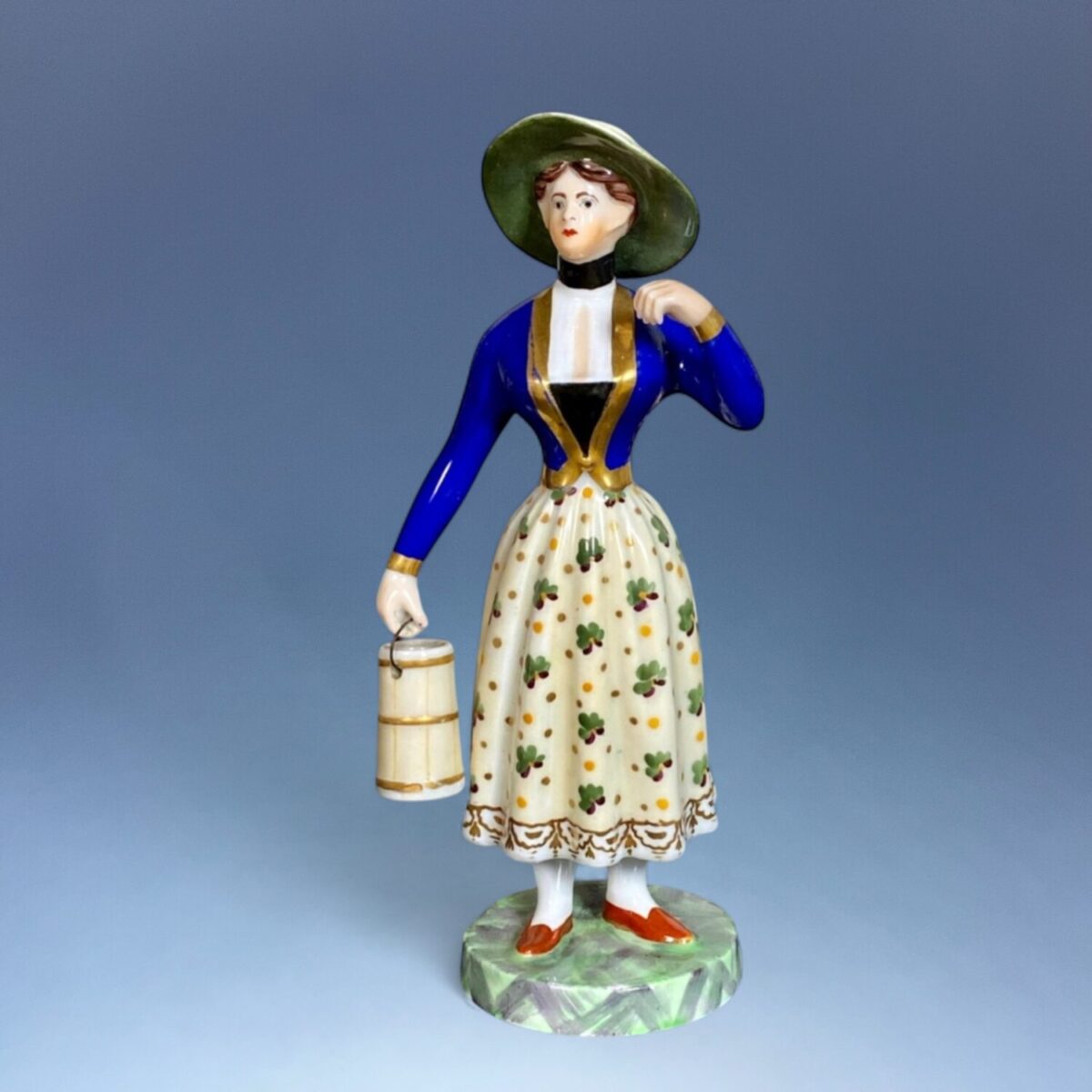 Chamberlains Worcester Porcelain Figure of a Milkmaid.
