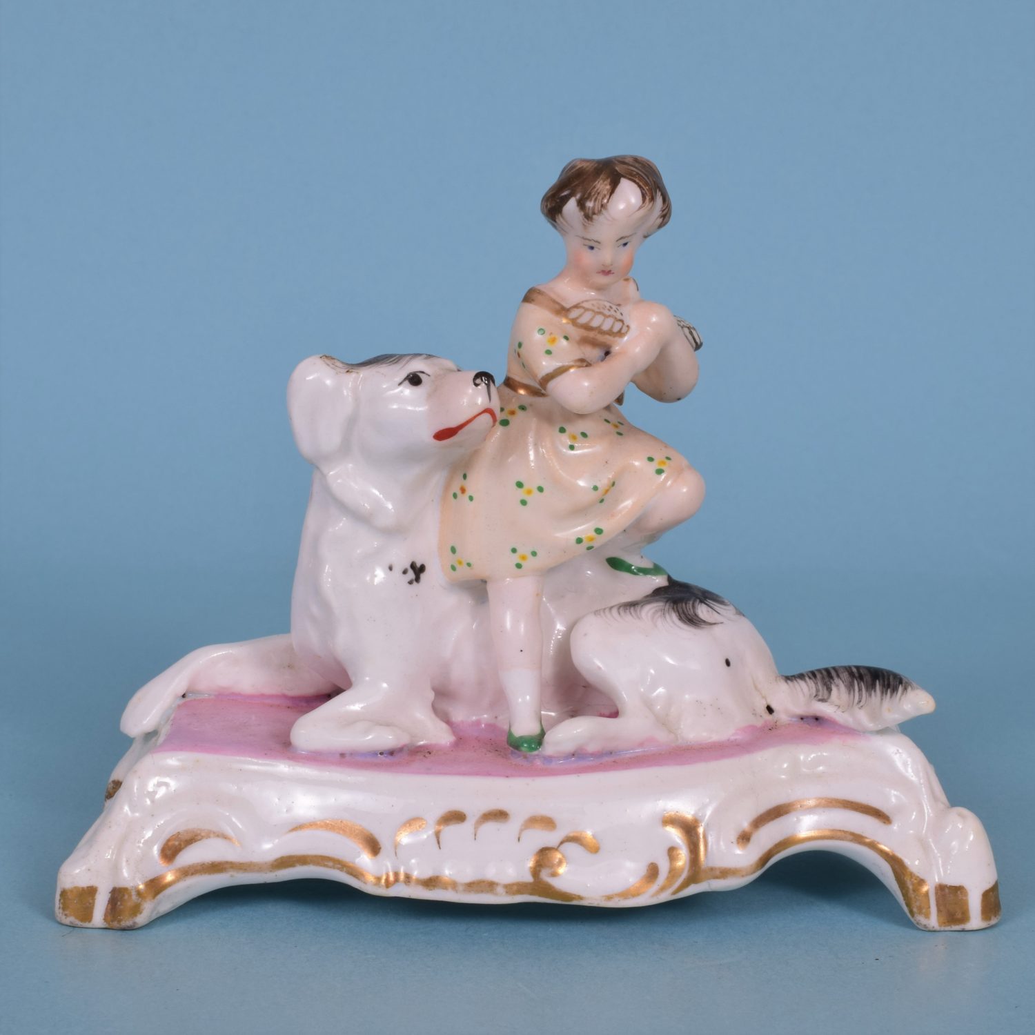 Staffordshire Porcelain Girl Sitting on a Dog.