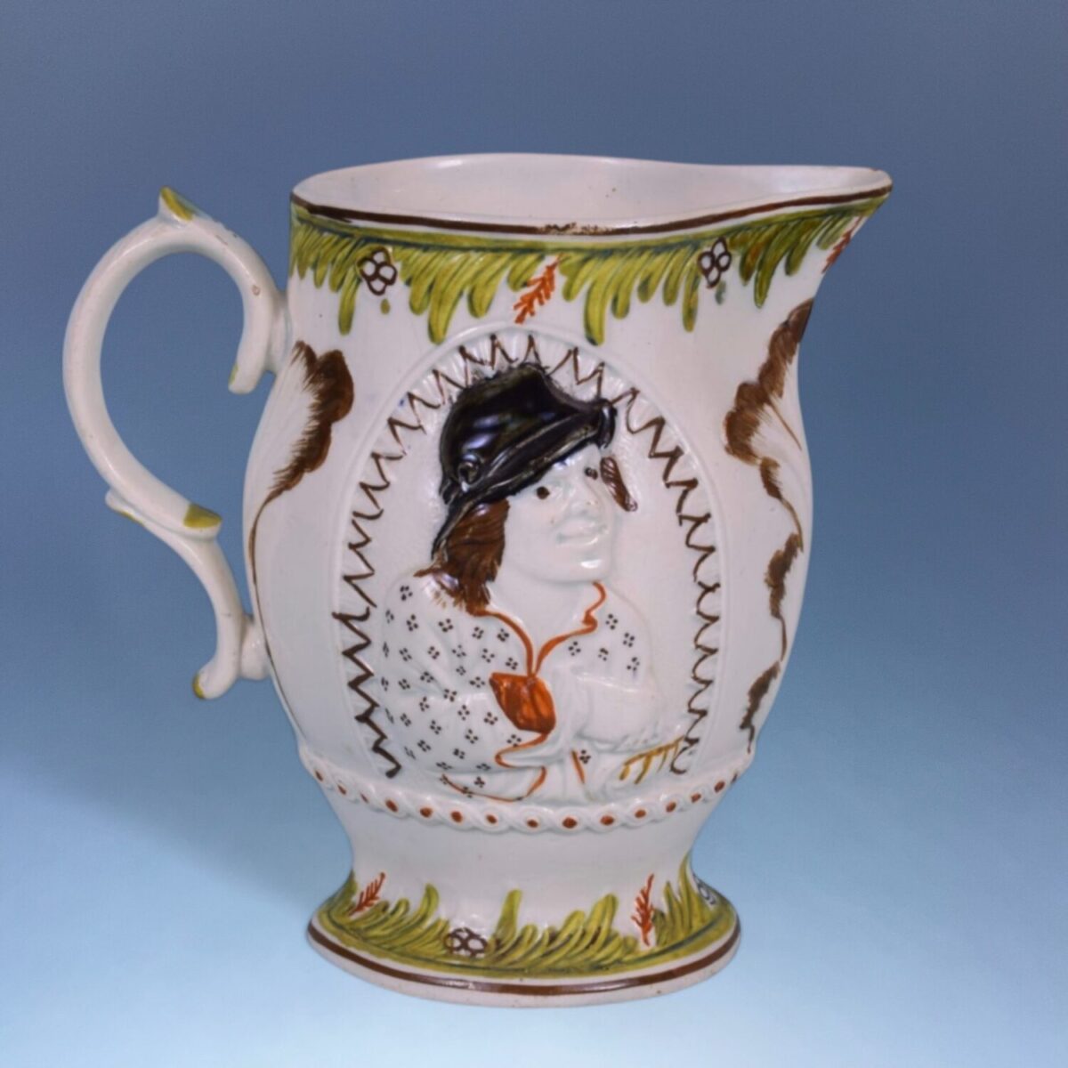 C19th Staffordshire ‘Pratware’ Pottery ‘Miser’ Jug.