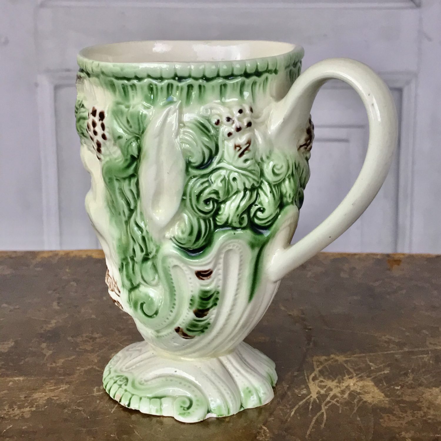 C18th English Creamware Satyr Mug.