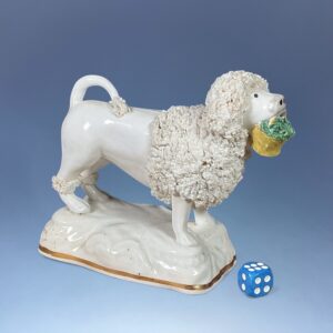 Staffordshire Porcelain Model of a Poodle Holding Basket