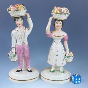 Pair of C19th Staffordshire Porcelain Figures of Flower Sellers.
