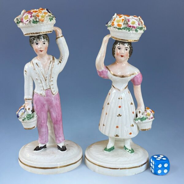 Pair of C19th Staffordshire Porcelain Figures of Flower Sellers.