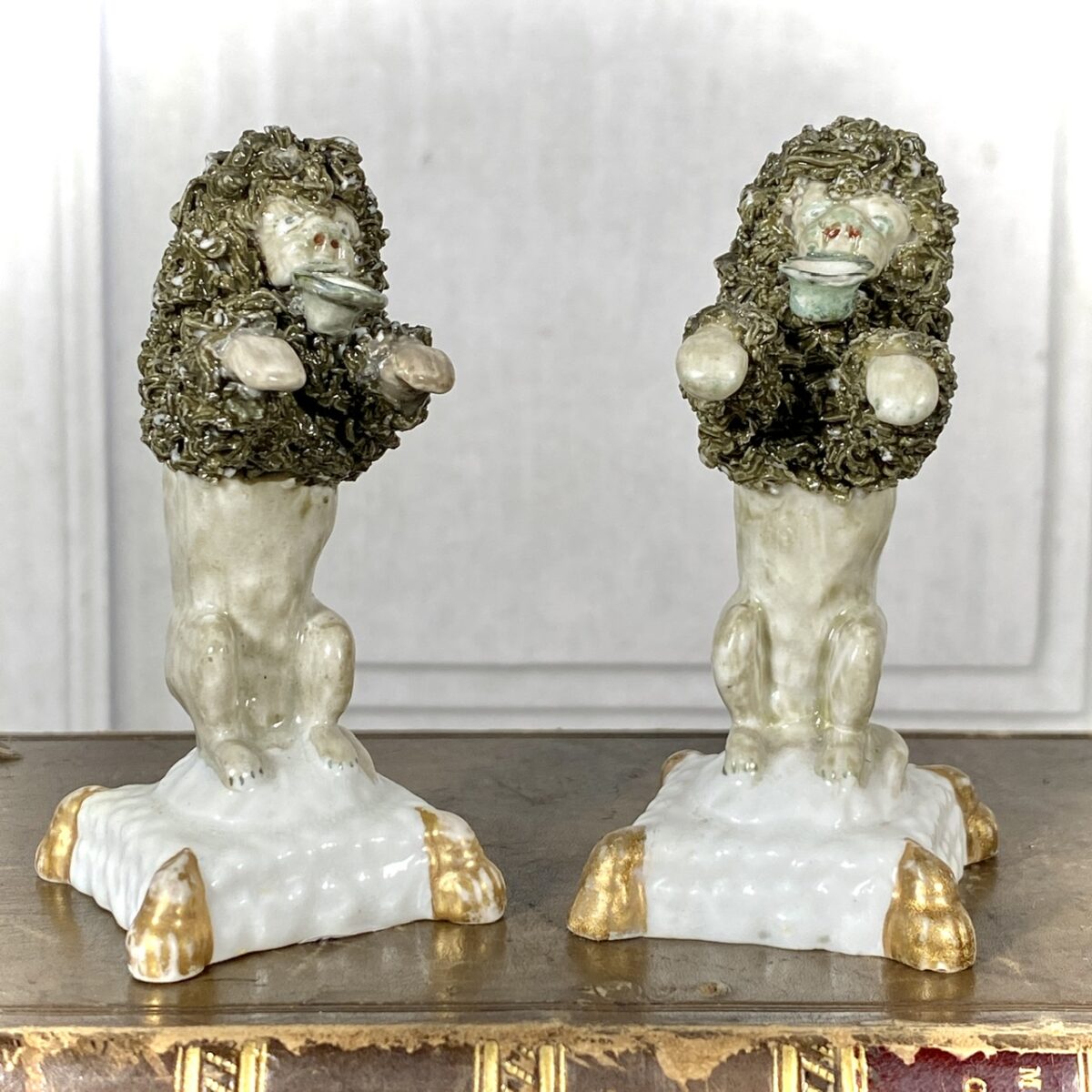 Pair of Staffordshire Minature Begging Poodles.