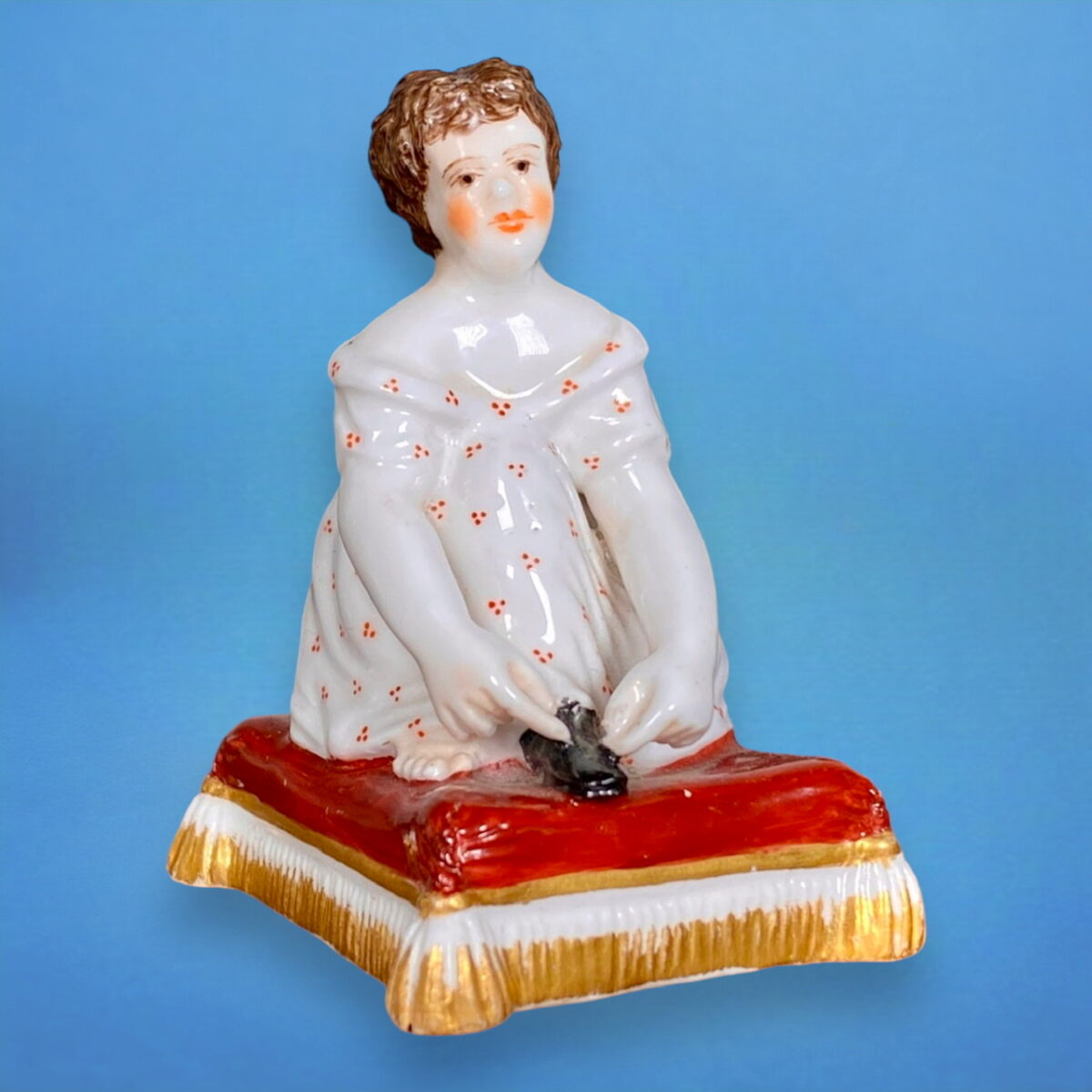 Old Crown Derby (King St) Porcelain Figure of a Girl, Kneeling.