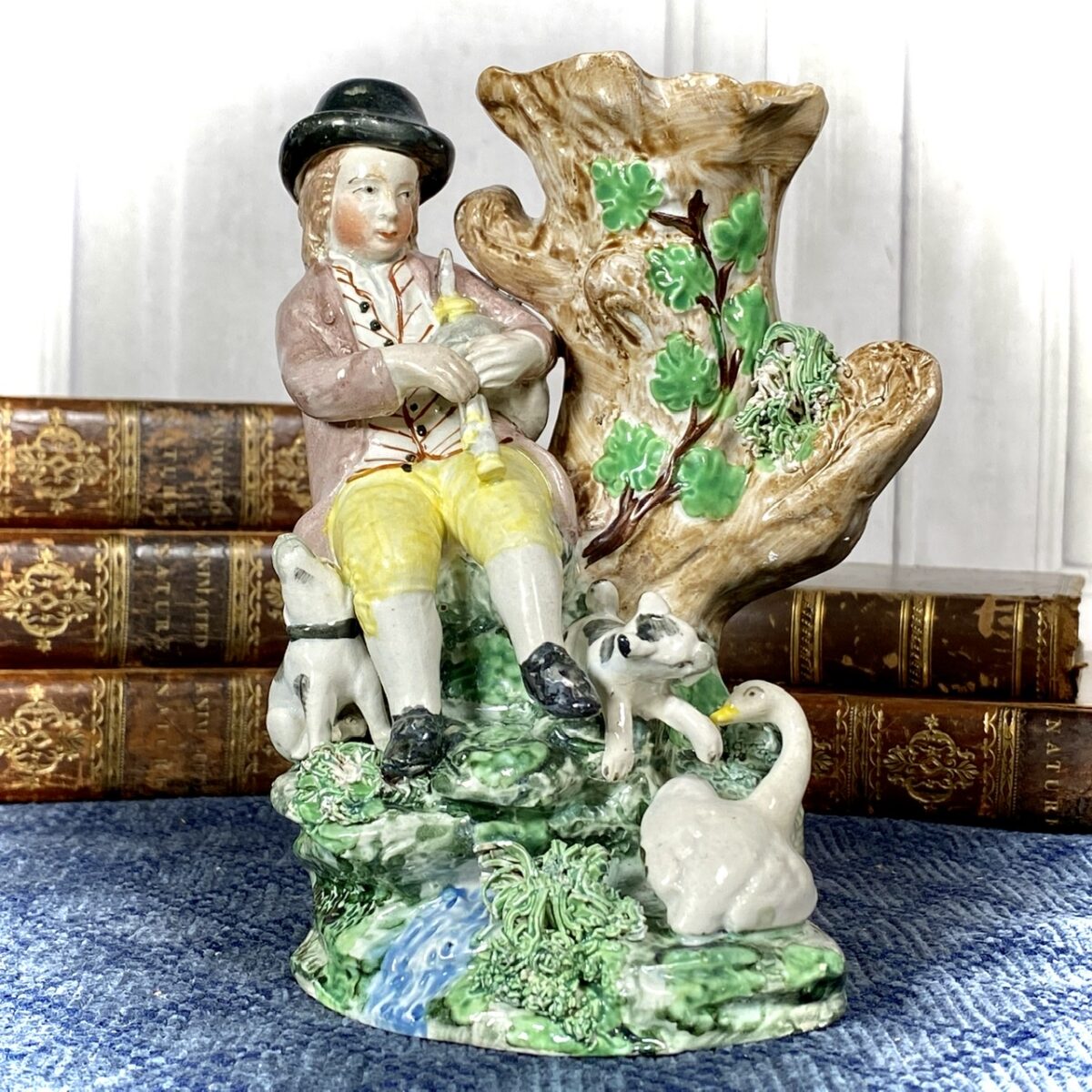 Staffordshire Seated Bag Piper With Dogs, Spill Holder.