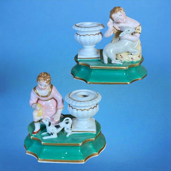 Pair of Staffordshire Porcelain Figures of Children With Animals.