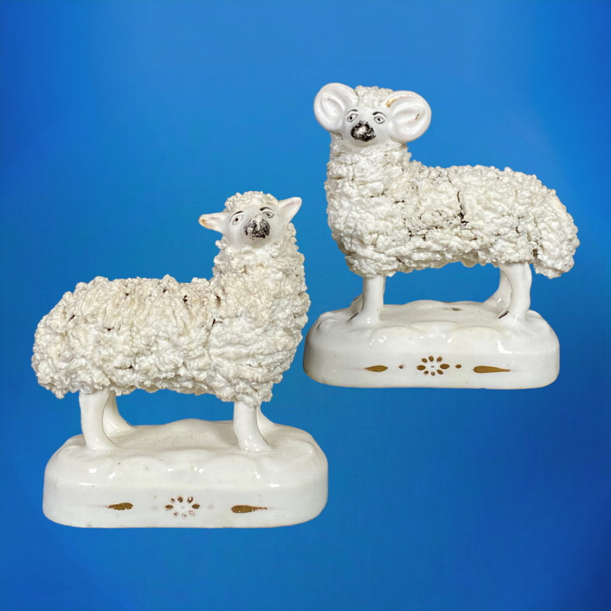 Pair of Antique Staffordshire Porcelain Ram & Ewe.