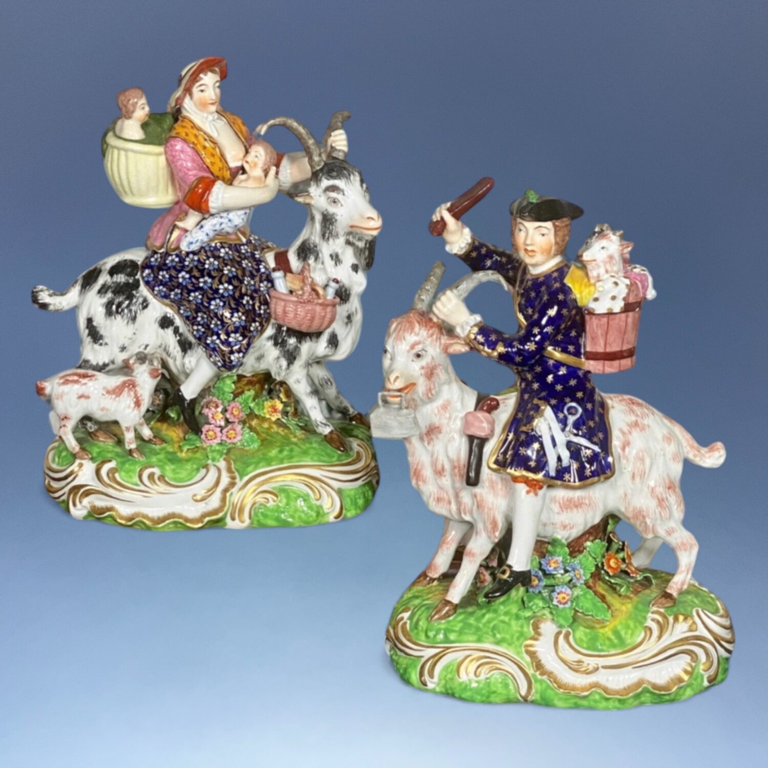 Pair of Bloor Derby 'Welch Tailor & Wife Riding Goats'