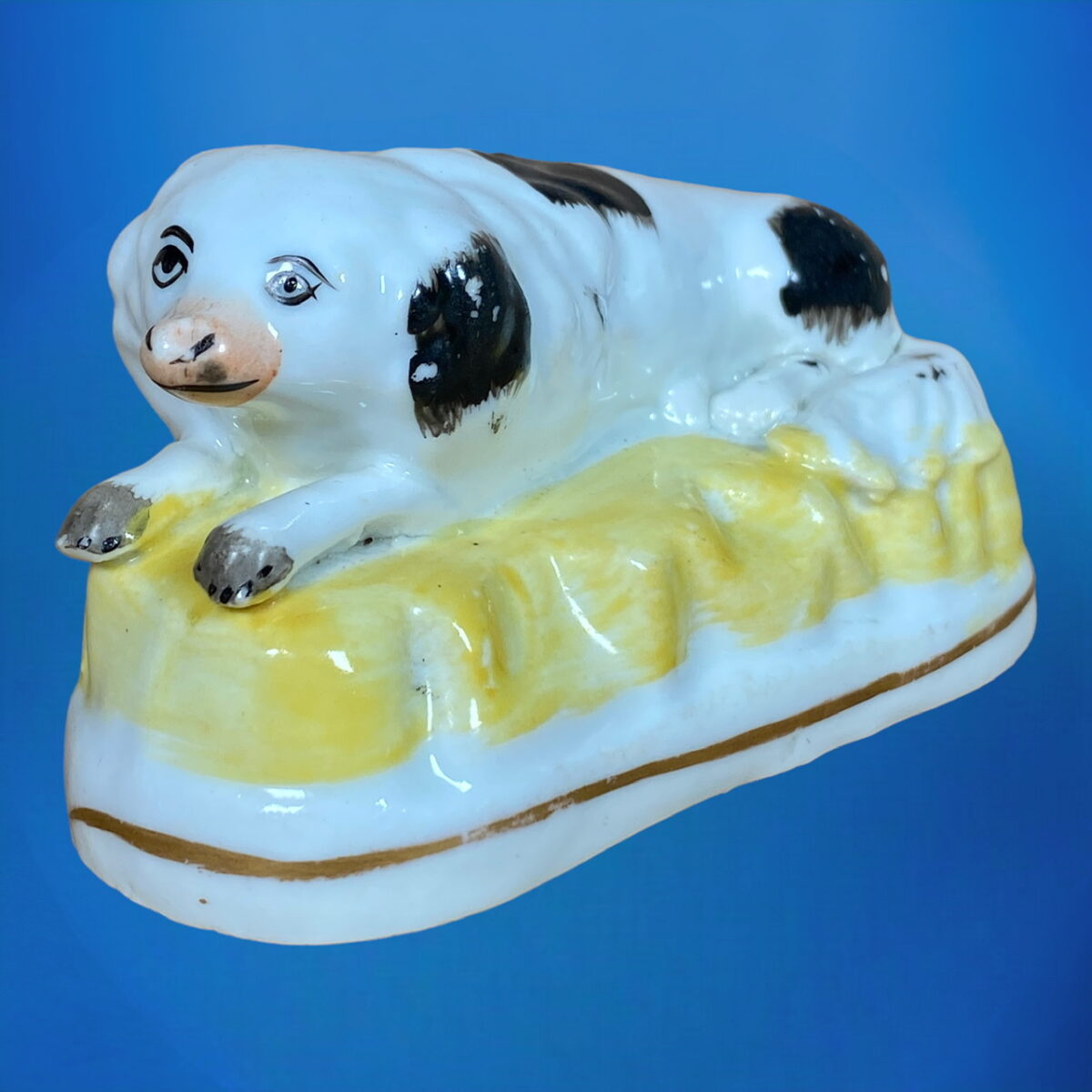 C19th Staffordshire Porcelain Dog on Yellow Base.