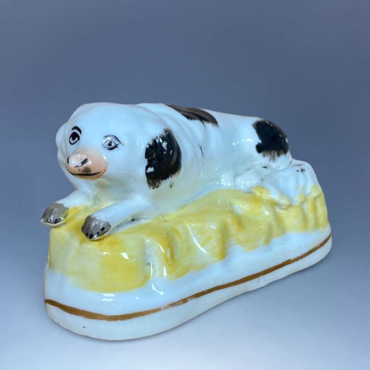 C19th Staffordshire Porcelain Dog on Yellow Base.