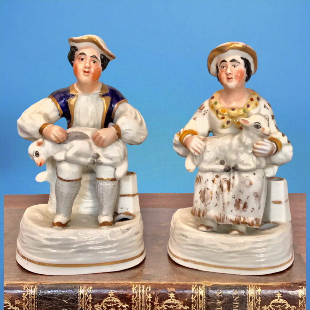 Pair of Staffordshire Porcelain Figures of Sheep Shearer & Shepherdess