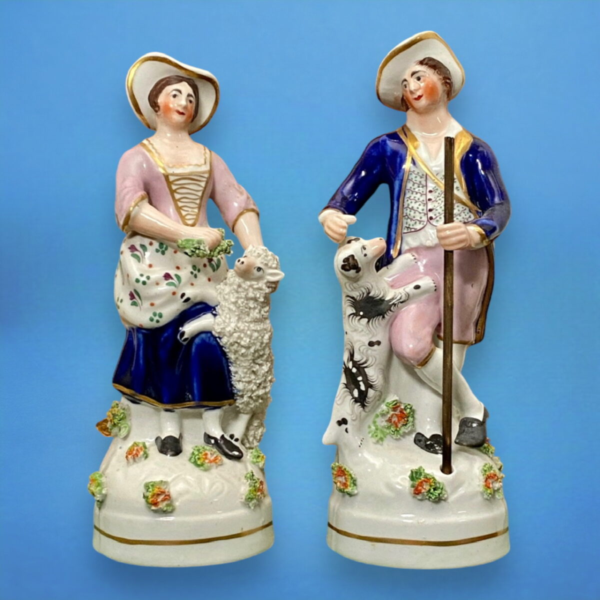 Pair of Staffordshire Porcelain Figures of Shepherd & Shepherdess.