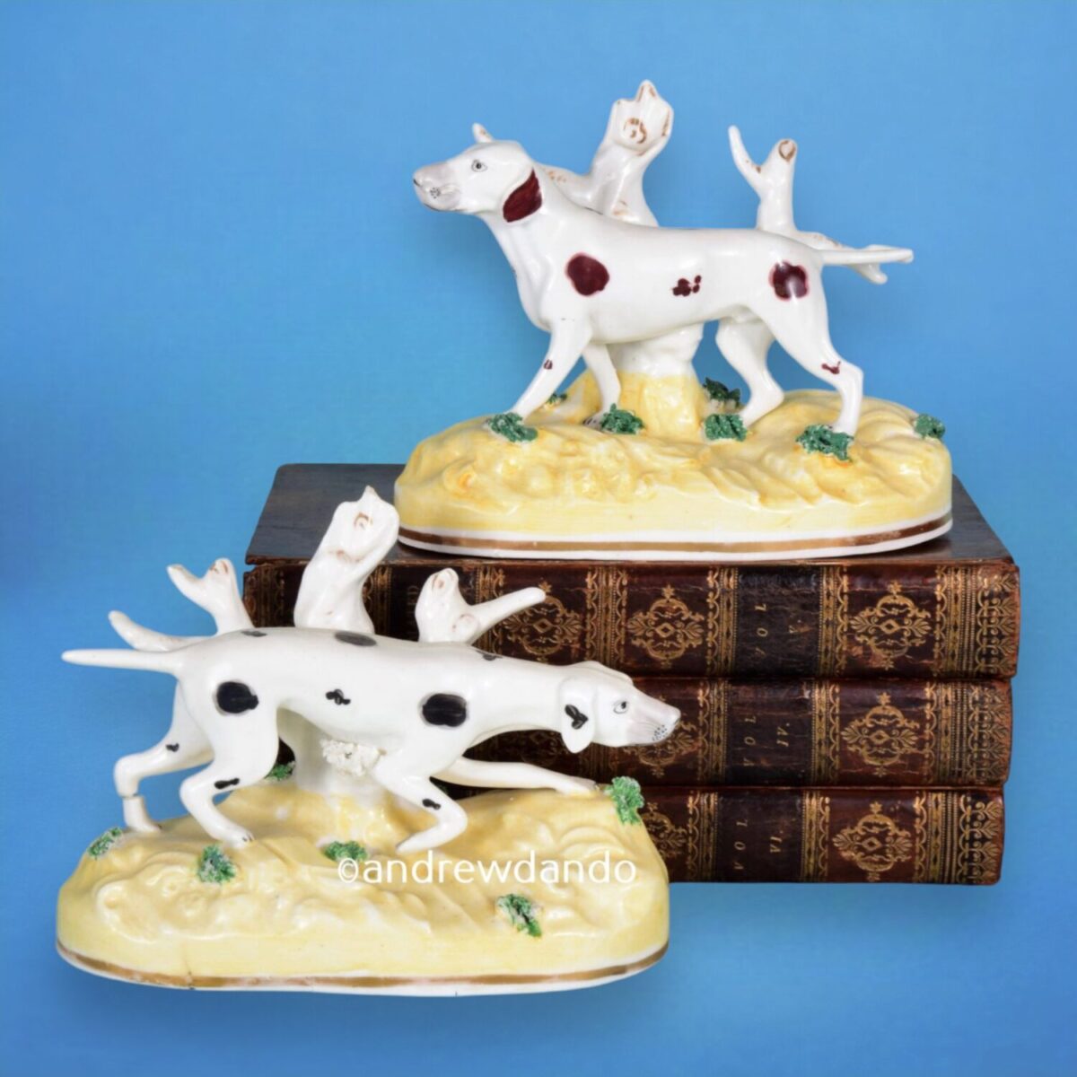 Pair of Antique Staffordshire Porcelain Pointers.