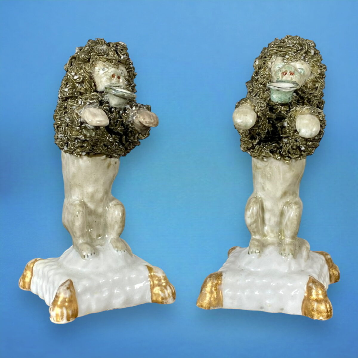Pair of Staffordshire Minature Begging Poodles.