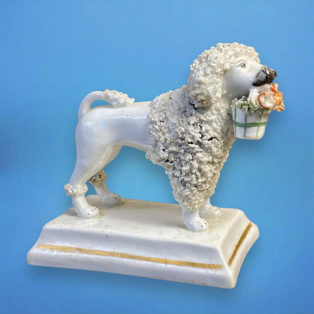 Antique Staffordshire Porcelain Poodle Holding a Basket