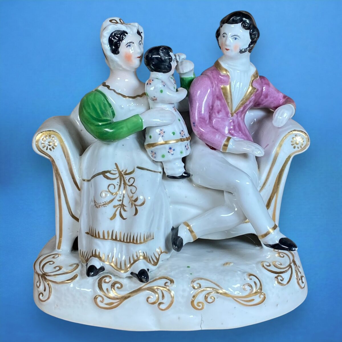 Staffordshire Porcelain Family Group on a Sofa