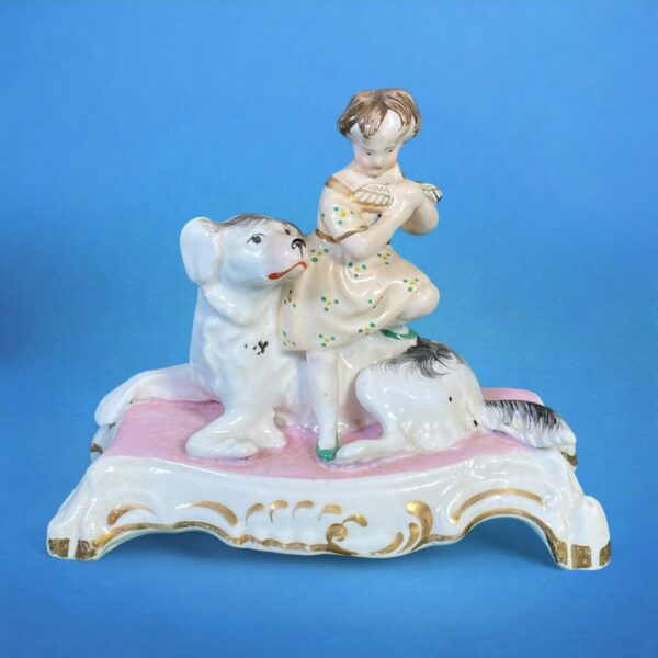 Staffordshire Porcelain Girl Sitting on a Dog.