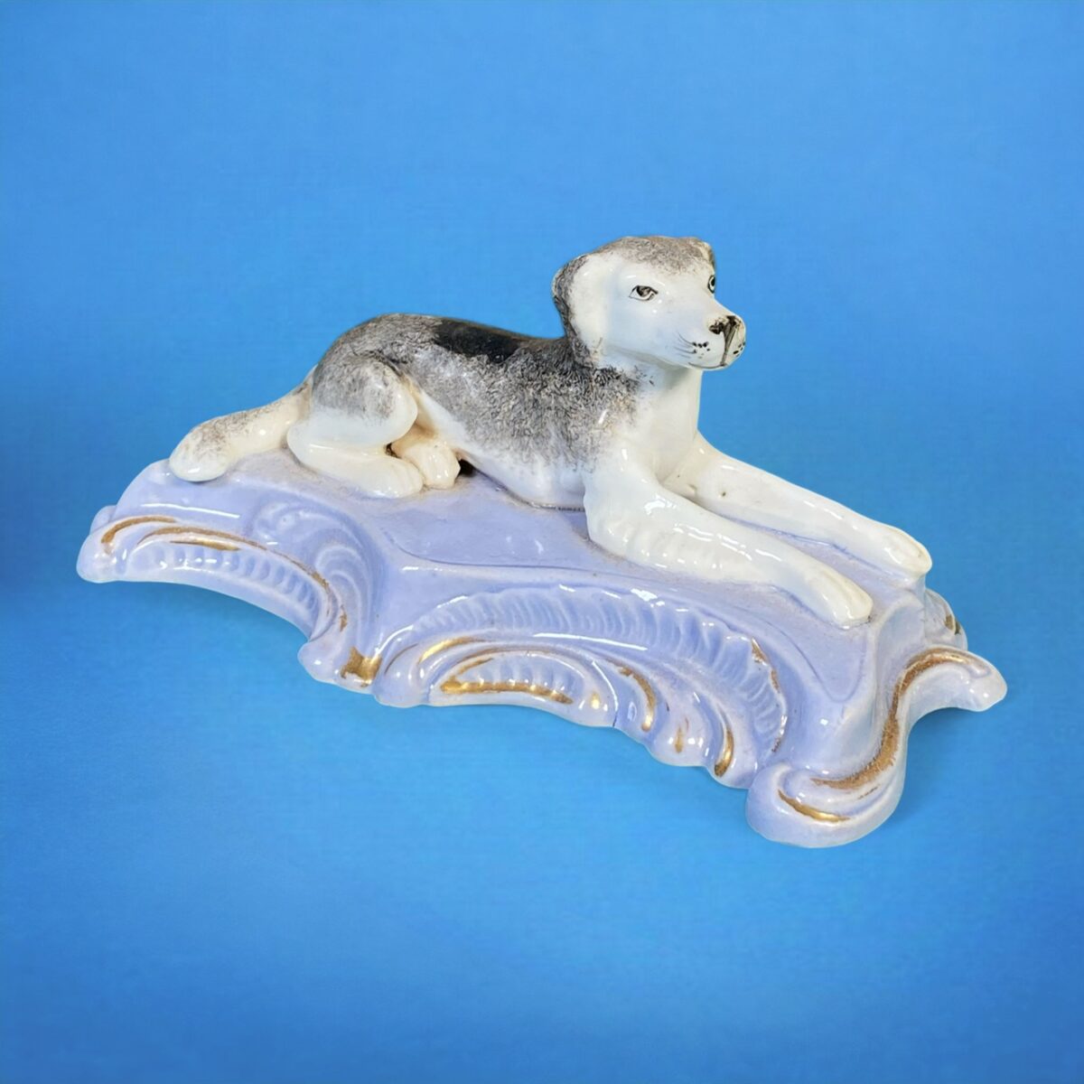 Staffordshire Model of a Dog on a Lavender Coloured Base.
