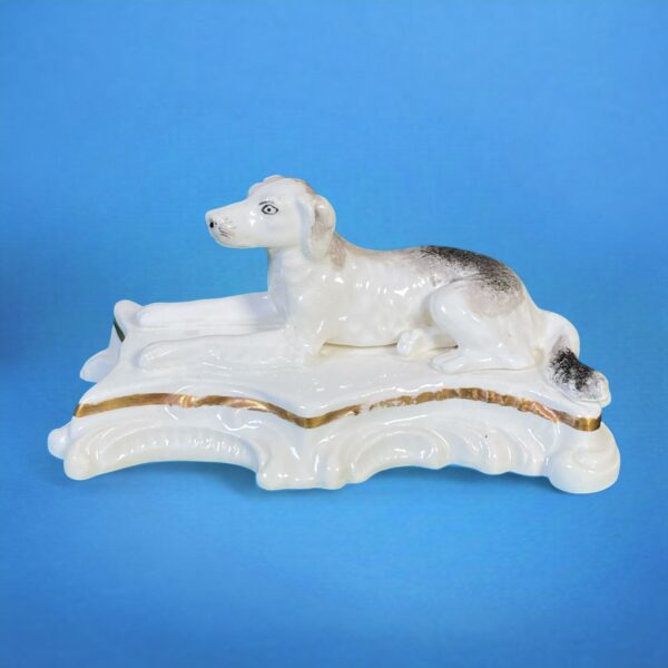 Staffordshire Porcelain Model of a Dog on Rococo Base.