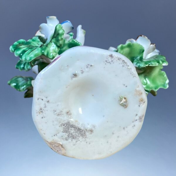 C18th Bow Porcelain Figure of a Putto in a Floral Arbour - Image 3