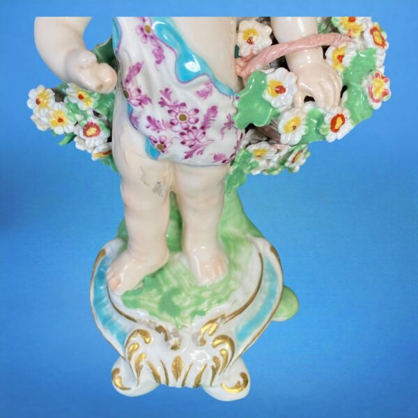 (Clearance) Chelsea-Derby Figure of a Putto With Basket of Flowers. - Image 5