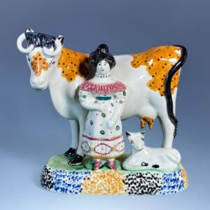 PrattWare Model of a Cow, With Female Attendant.