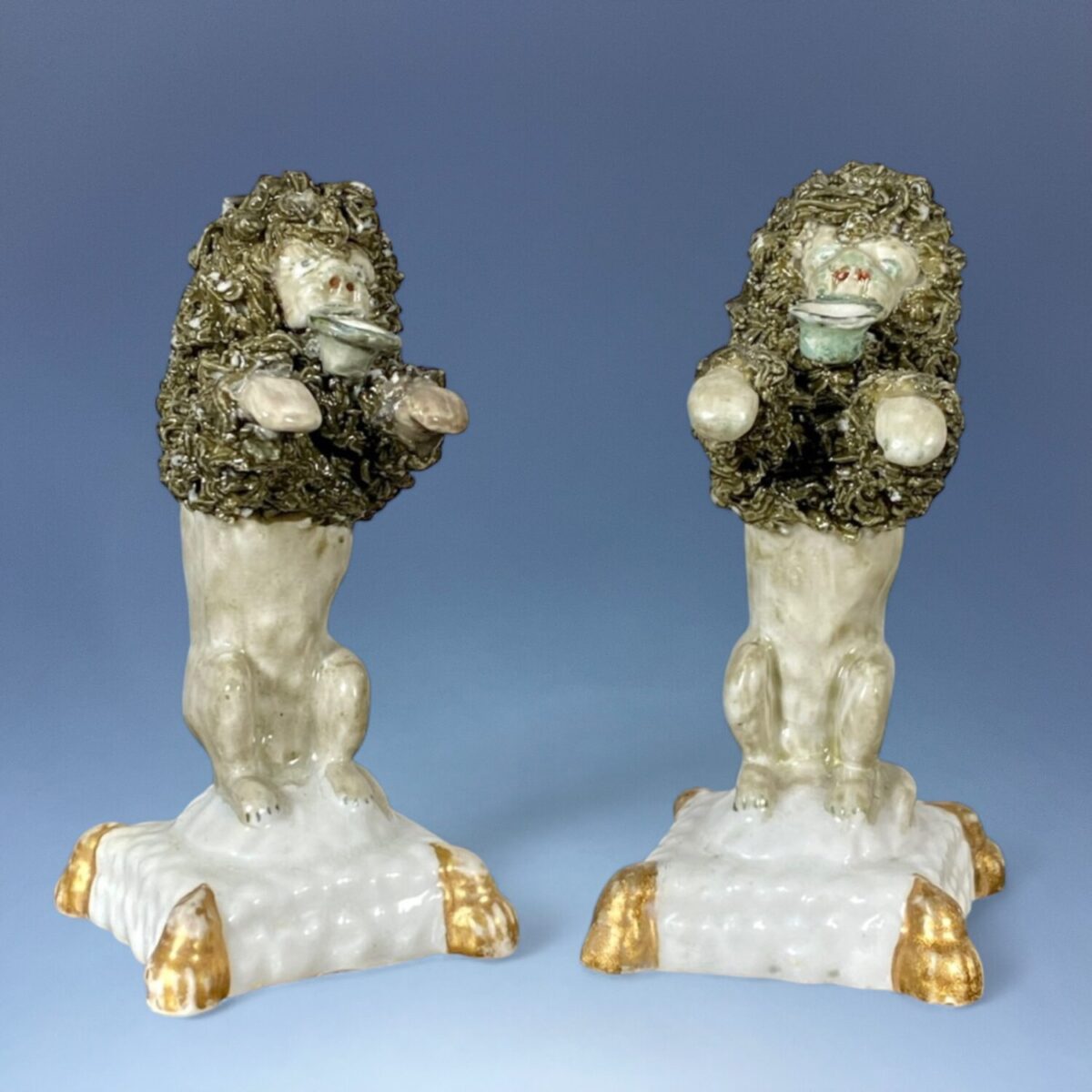 Pair of Staffordshire Minature Begging Poodles.