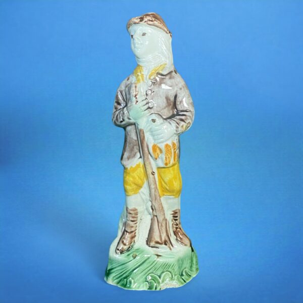 Early Staffordshire Figure of a Gamekeeper.