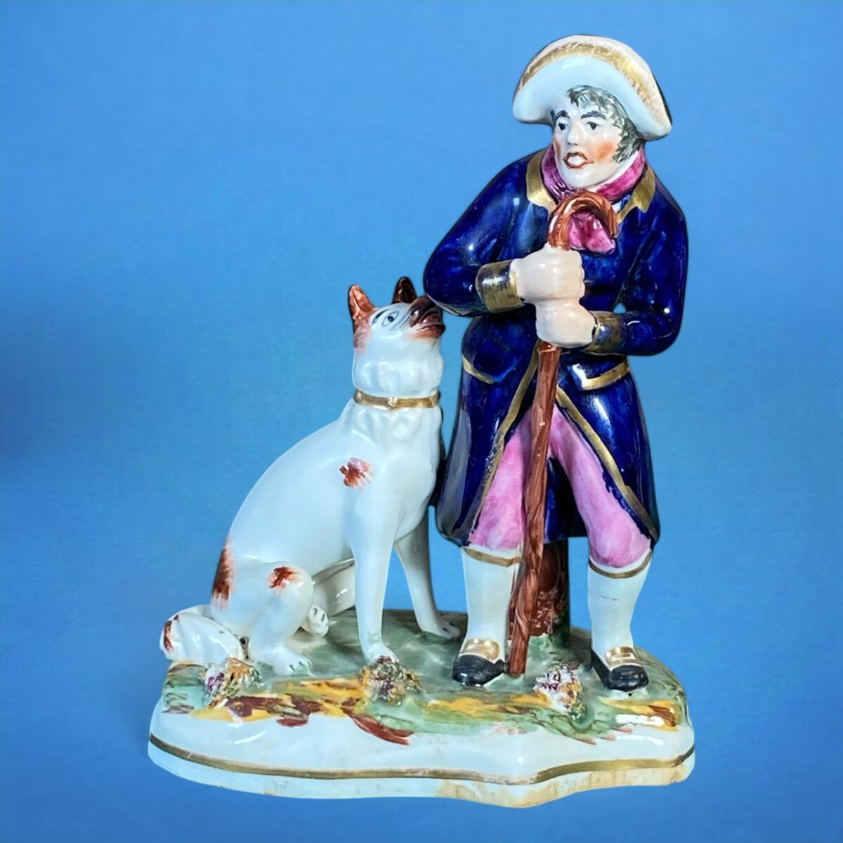 Staffordshire Figure of a Shepherd With His Dog.