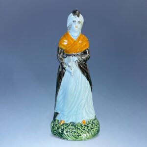 C18th Staffordshire Pottery Figure of a Woman Holding a Fan.
