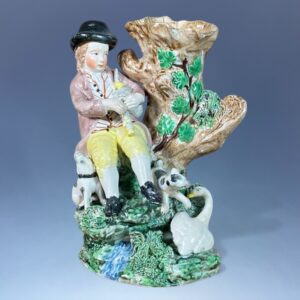 C19th Staffordshire Pottery Seated Piper Spill Holder, c1810