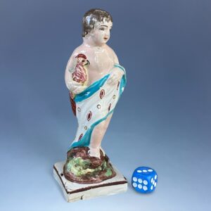 Staffordshire Pottery Small Figure - Boy Holding a Cockerel.