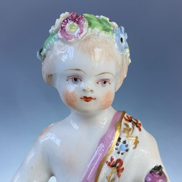 C18th BOW Porcelain - Small Figure of a Putto With Basket of Fruit. - Image 3