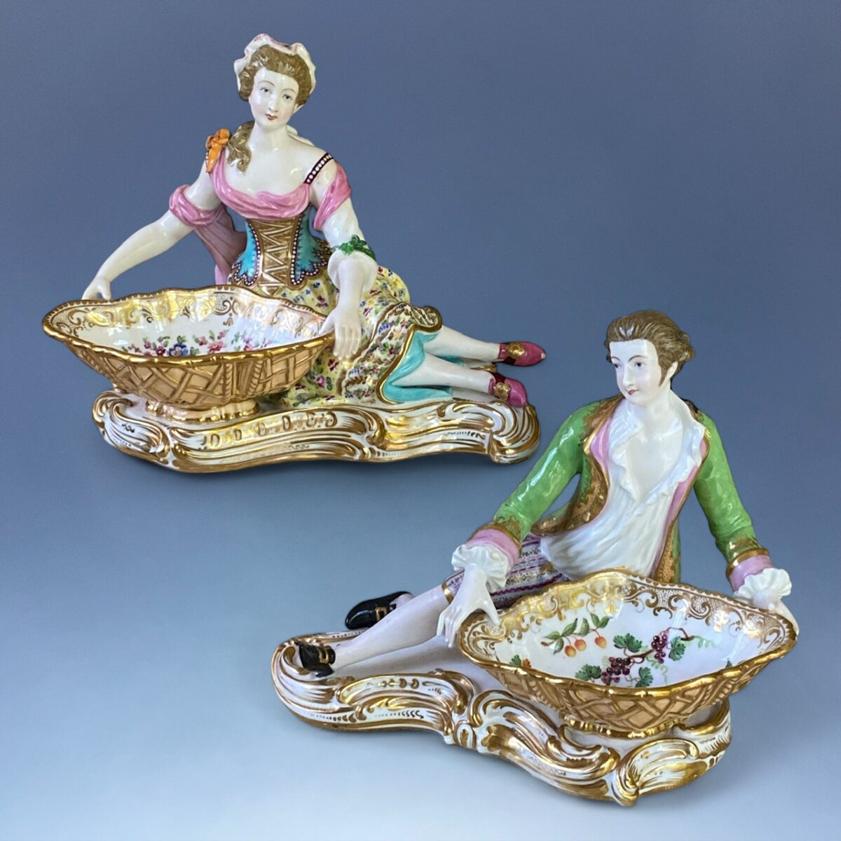 C19th MINTON – A Fine Pair of Figures with Sweetmeat Bowls.