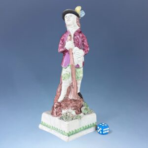 Early Staffordshire Pottery Figure of a Hunter Holding a Duck