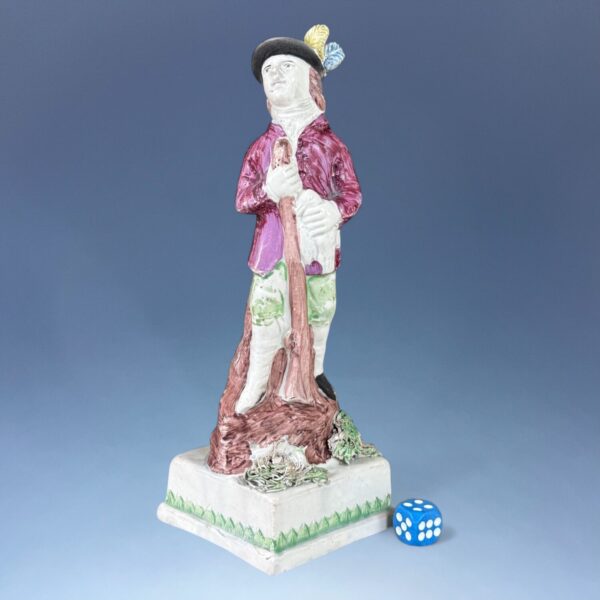 Early Staffordshire Pottery Figure of a Hunter Holding a Duck