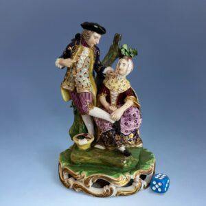 Derby Porcelain figure of the Stocking Mender.