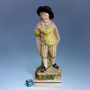 Staffordshire Pottery Figure of a Boy - Skating.