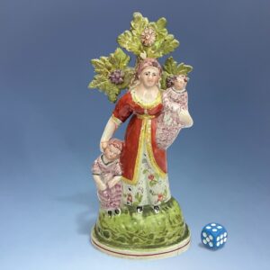 (Clearance) Staffordshire Pottery Figure of Charity.