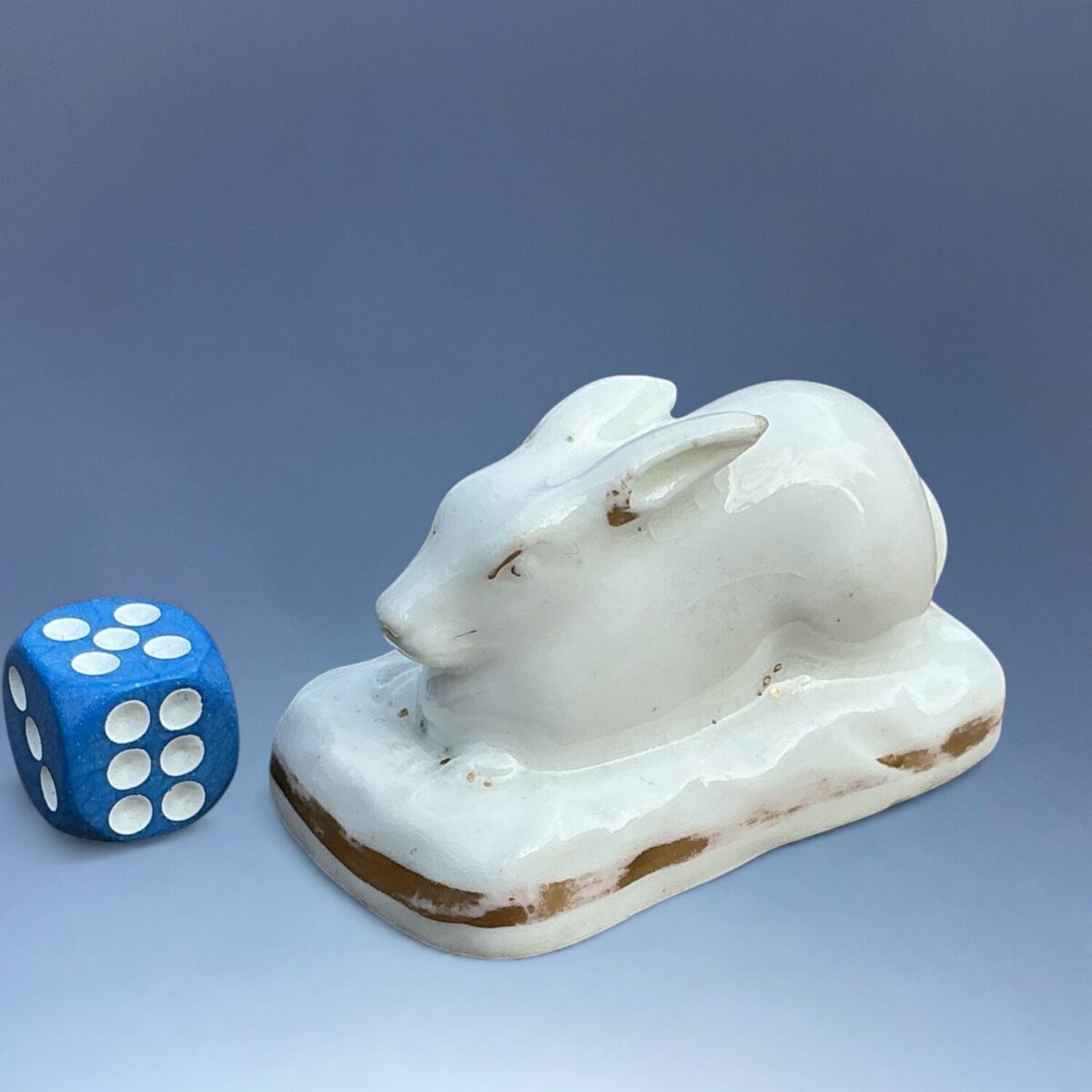 English Porcelain Model of a Crouching Rabbit.