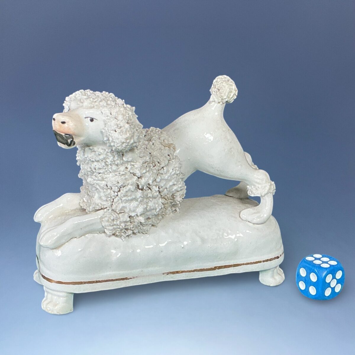 C19th Staffordshire Porcelain Crouching Poodle.