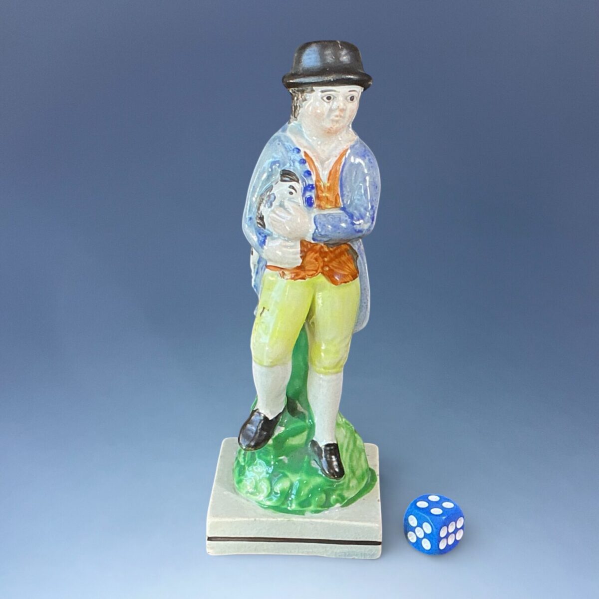 Early Staffordshire Pottery Figure of a Young man Holding a Cockerel.