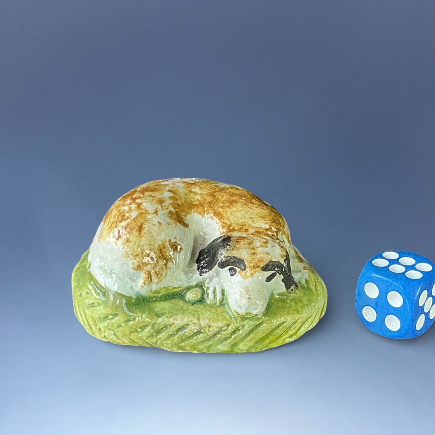 Early Staffordshire - Pratt Ware Model of a Sleeping Dog.