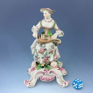 C18th Bow Porcelain Figure of a Hurdy Gurdy Player