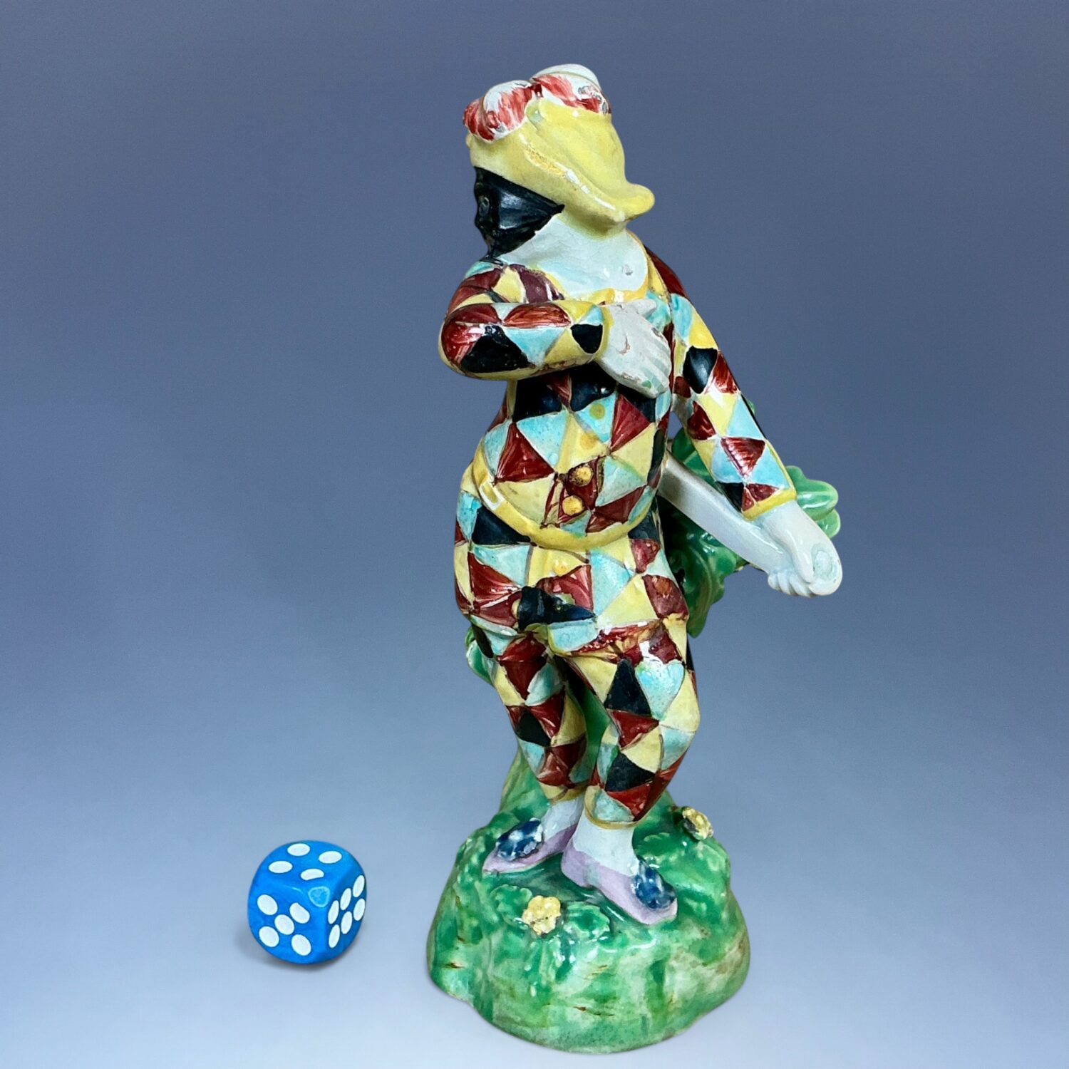 C19th Staffordshire Pottery Figure of Harlequin