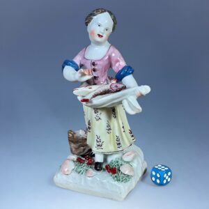 C18th Bow Porcelain Figure of a Fish Seller