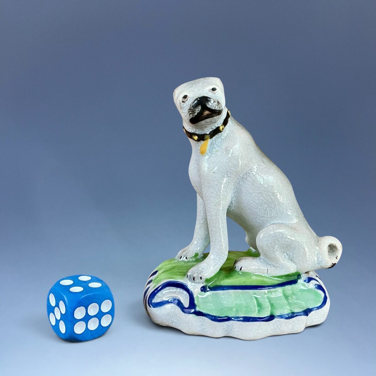 Early Staffordshire Pottery Pug Dog on Scroll Moulded Base